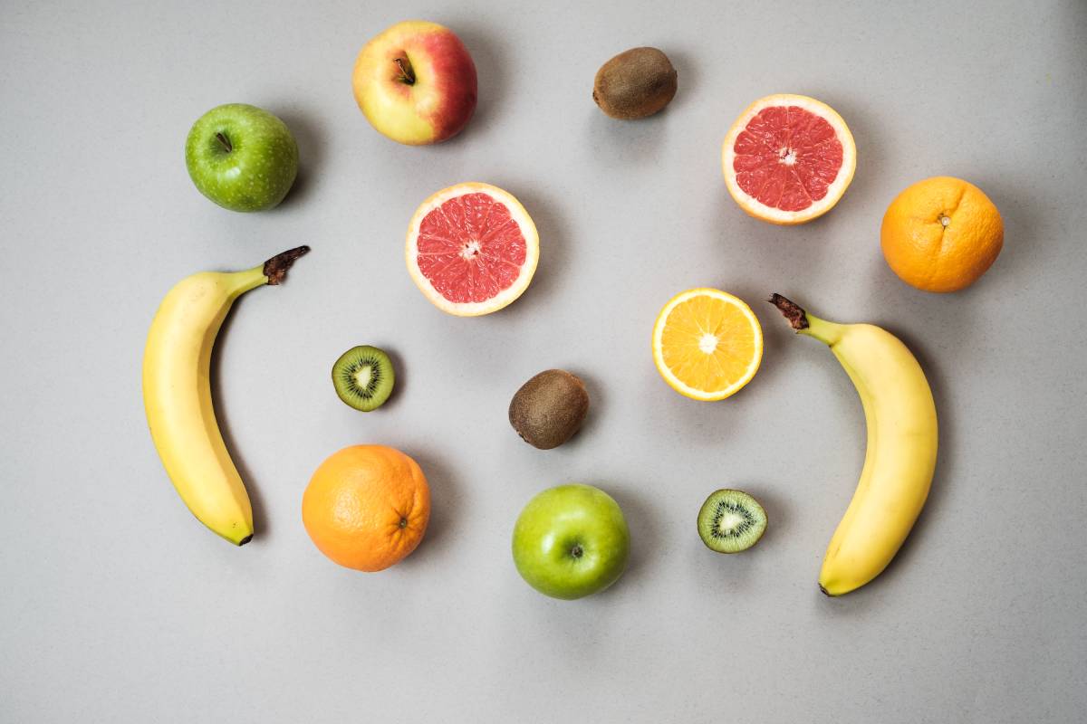 colorful-fresh-fruit-on-gray-table-orange-banana-2024-09-18-01-20-46-utc (1)