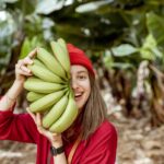 woman-with-banana-stem-on-the-pantation-2023-11-27-05-05-11-utc (1)