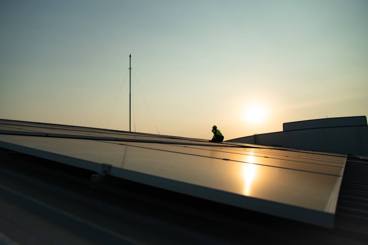 Technicians provide quarterly solar cell maintenance services on the factory roof