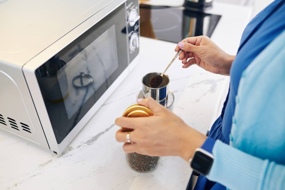 Woman making coffee